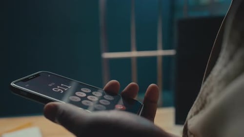 Man dials 911 on phone behind bars