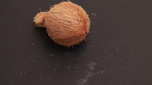Close-up of a Whole Coconut on a Surface