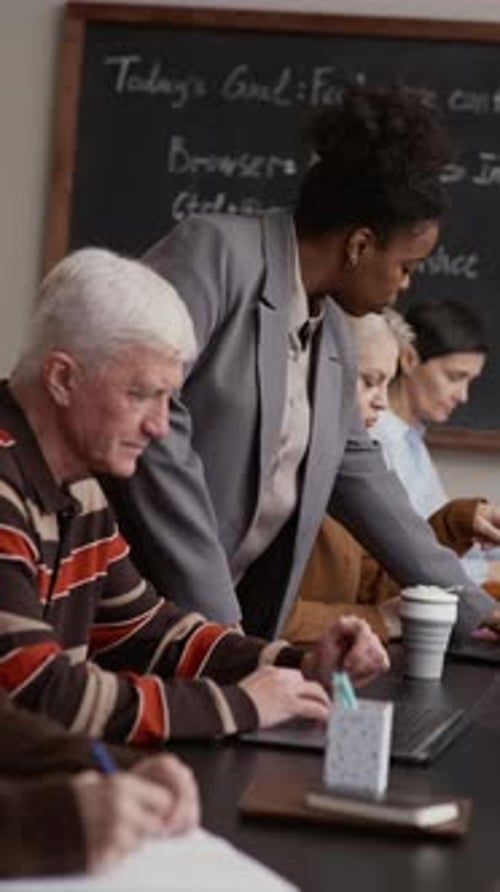 Adults Learning New Skills in an Office Environment