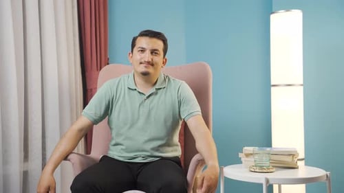 Man looking negative at camera.