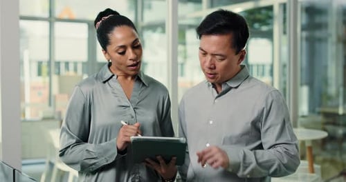 Collaboration, business people or communication with tablet for budget review