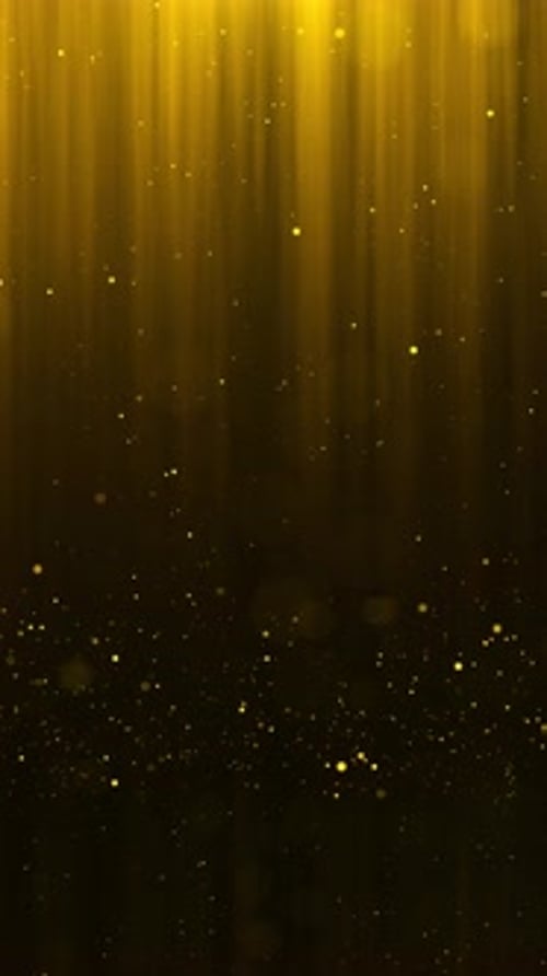 Beautiful Golden glitter background slow motion. transition real gold particles flying in wind shot