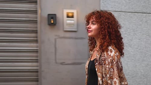 Woman Walking in the City with Floral Jacket