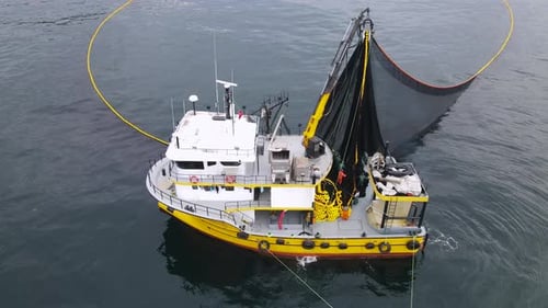 Fishing Boat Gathering Its Nets