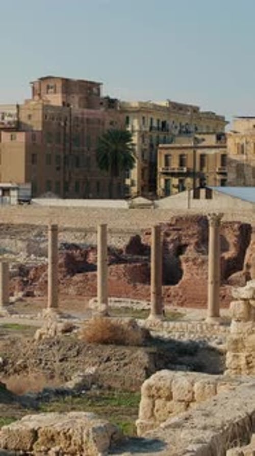 Ancient Roman Columns and Ruins in Historic Mediterranean City
