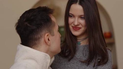 Young Woman Shares Loving Glance with Boyfriend
