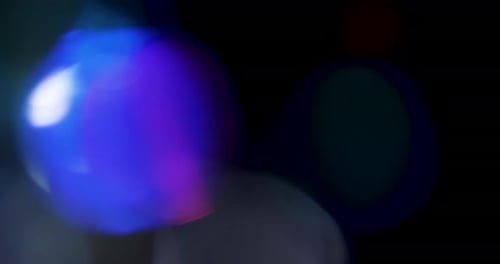 Colorful Light Leaks Overlay on Black Background