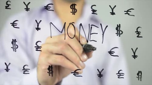 Hand Writing Money Amongst Currency Symbols