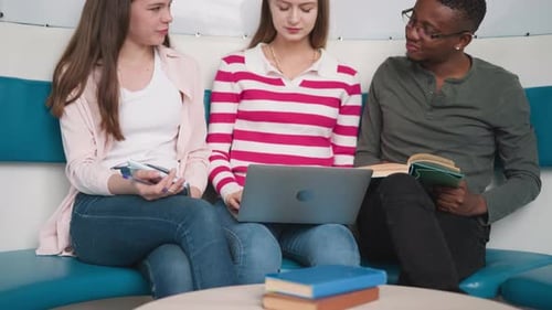 Friends Gather Educative Materials in Library