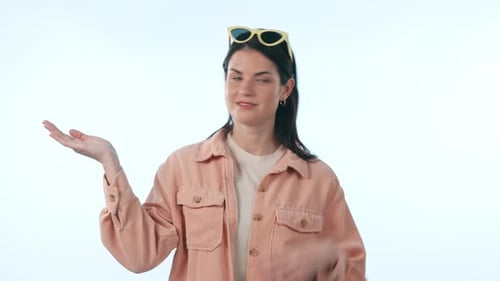 Happy woman, palm and decision in choice, advertising or marketing against a studio background