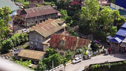 Elevated View of Village with Buildings and Trees