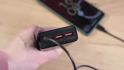 Phone is charging with modern USB Type-C power bank