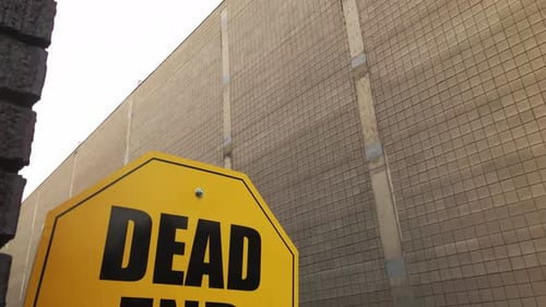 Tilt Down to Alleyway with Dead End Sign