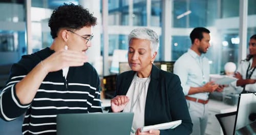 Man, manager and developer on laptop in office for programming, IT training and software update