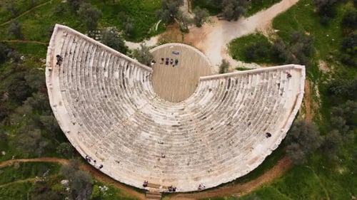 Fly Up Above 1st Century BCE Ancient Amphitheater Overlooking the Mediterranean Sea Towards Greek Is