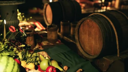 Rustic Harvest Feast Table Setting with Barrels and Assorted Fruits