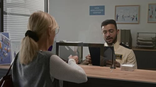Visa Application Center, Woman Speaks With Security Guard
