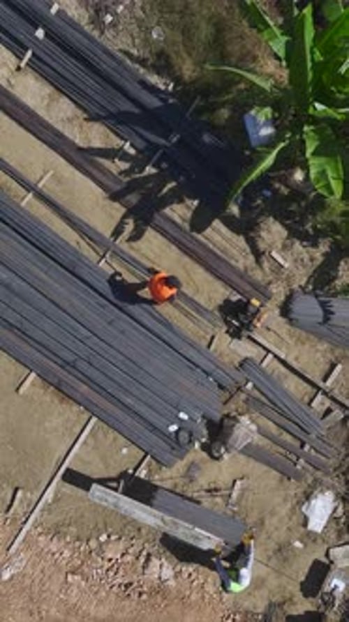 Vertical Video Engineers Inspect Foundation Waterproofing and Metal Work As Building Construction