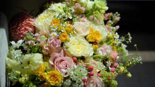Bouquet of colorful flowers close-up, pink and yellow