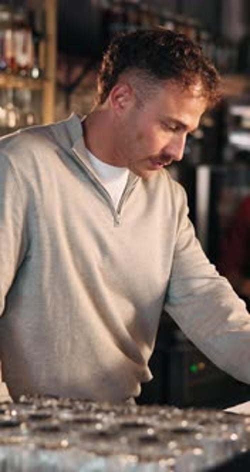 Bartender, manager and typing at pub for POS, inventory checklist and inspection for small business