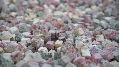 Lots of colorful Turkish delights close up 4K