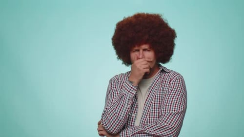 Man Coughing Due to a Cold in Studio