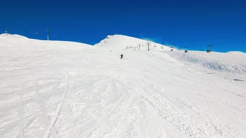 Male Skier Enjoy Skiing Downhill