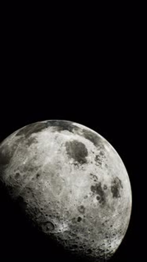 Illuminated Face of the Moon Visible From Space Vertical