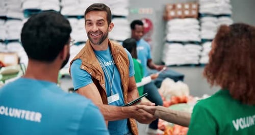 Volunteers Organize in Warehouse Setting
