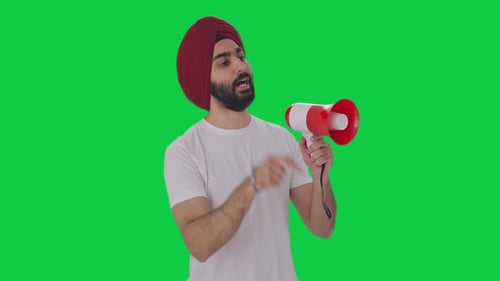 Sikh Indian man protesting for rights Green screen