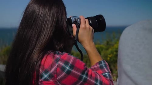 Woman Taking Photos of Ocean Coast Man Couple Photography Active