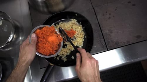 Cooking Vegetables on Stove Top in Restaurant Kitchen