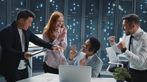 Team Celebrates Success in a Modern Workplace