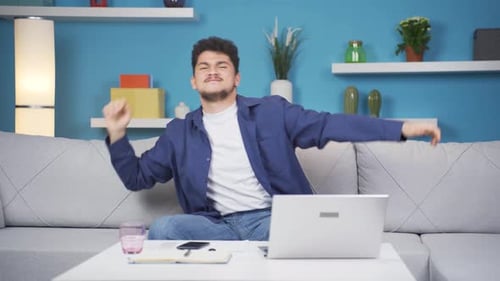 Happy man dancing to the camera.