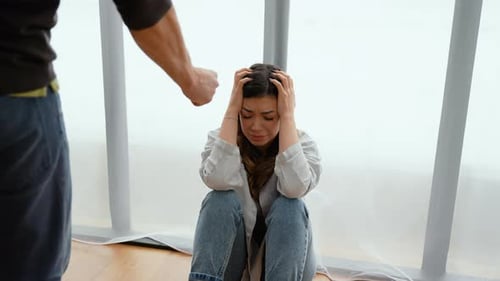 Distressed Woman with Hands in Hair, Angry Man