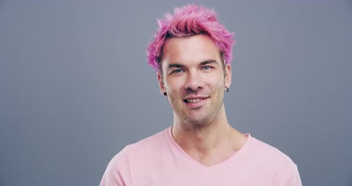 Man with Pink Hair Makes Heart Shape