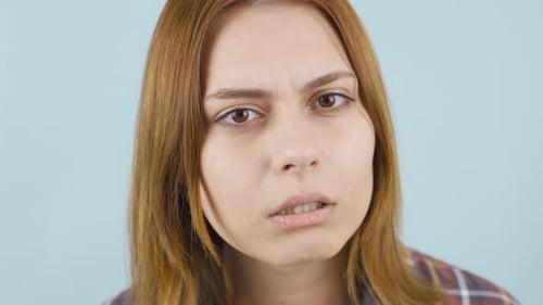 Woman Close Up With Confused Expression