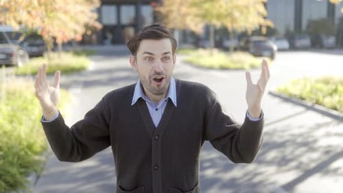 Surprised Man Smiles Outdoors