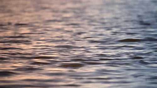 Morning Waves on the River at Sunrise