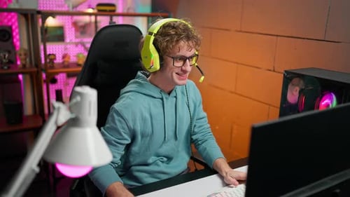 Excited Young Adult Winning at Online Game