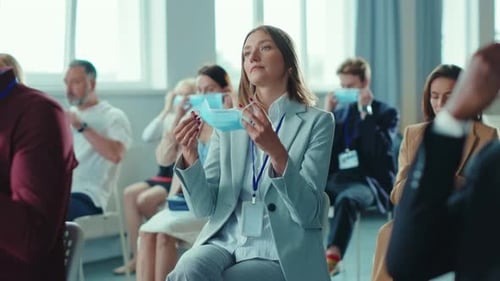 Adults Wearing Face Masks at an Indoor Conference