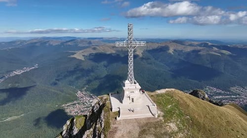 View of the Cross of Heroes on Mount Caraiman in the Bucegi Mountains, Romania