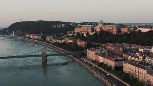 Budapest, Hungary - 4K Establishing aerial footage at sunrise of Chain bridge, Danube river and Buda