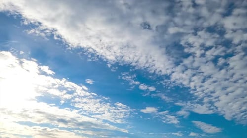 Clouds Moving Across Vivid Blue Sky