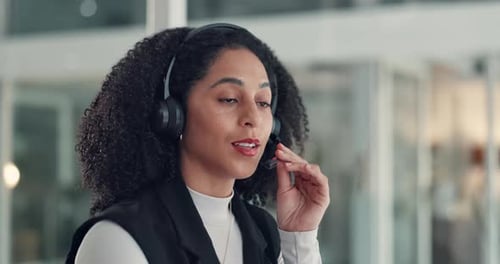 Black woman, consultant and talking with headset for virtual assistance or online advice in office