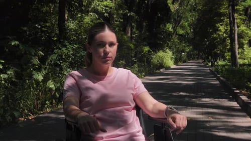 Woman in Wheelchair in Park