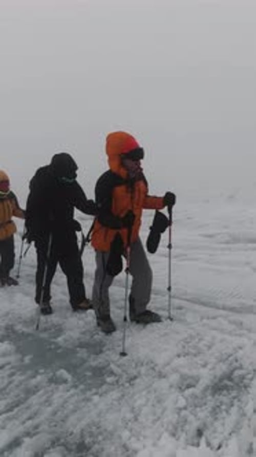 Mountaineering Activity on the Steep Mountain Slope Clip Group of Extreme Tourists Walking One By