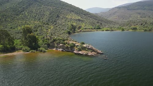 Scenic Headland on Lake Bafa with Green Hills in Western Turkey
