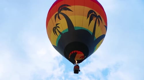 Colorful Hot Air Balloon Floating in Sunny Sky
