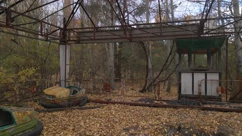 Decayed Autodrome with Bumper Cars in Ghost Town Pripyat in Radioactive Chernobyl Exclusion Zone